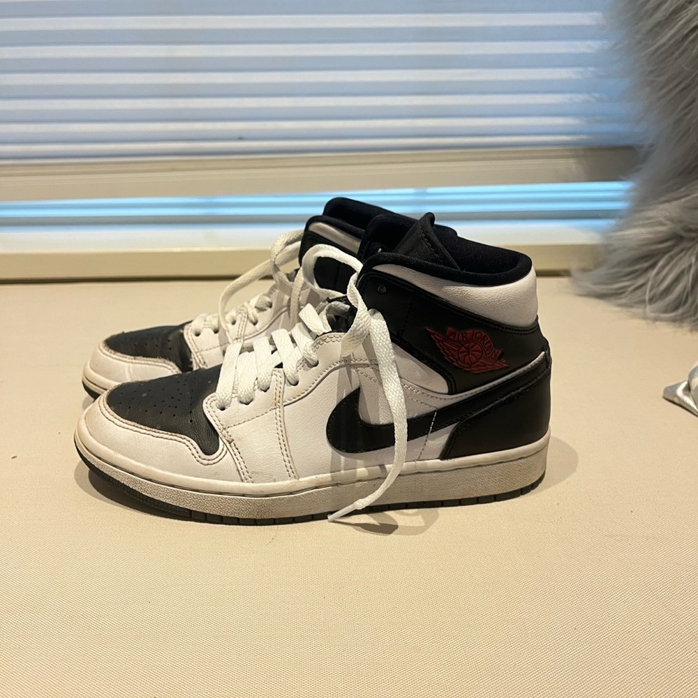 white black and red jordan’s